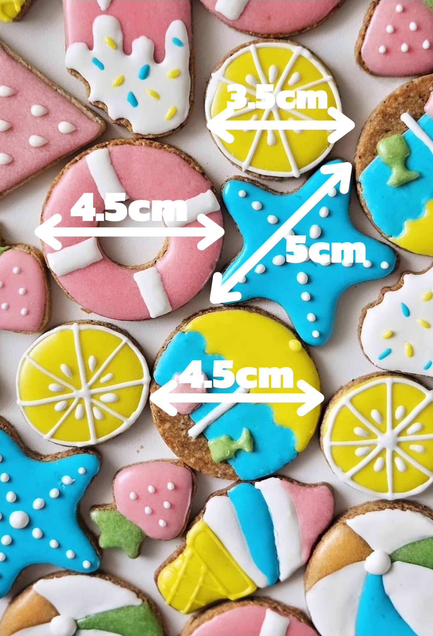 Hand-cut decorated dog cookies in bright summer colors
