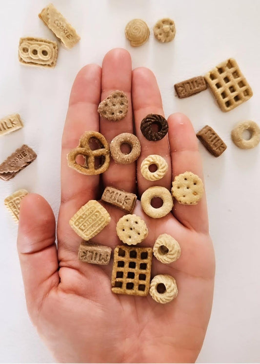 Minis for Minis – assortment of hand‑decorated tiny dog treats with natural ingredients