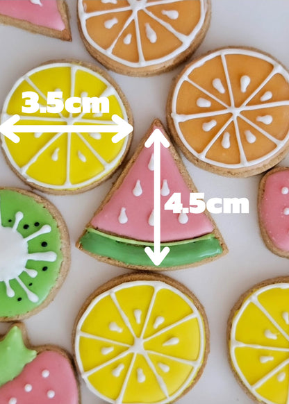 Colorful fruit‑decorated dog cookies baked fresh in London