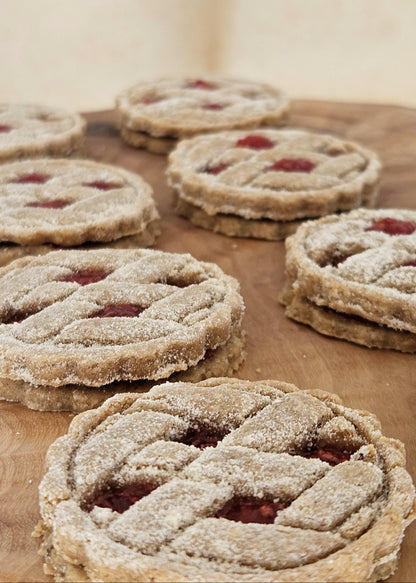 6 hand‑decorated Bark Berry Pies dog cookies made with human‑grade ingredients